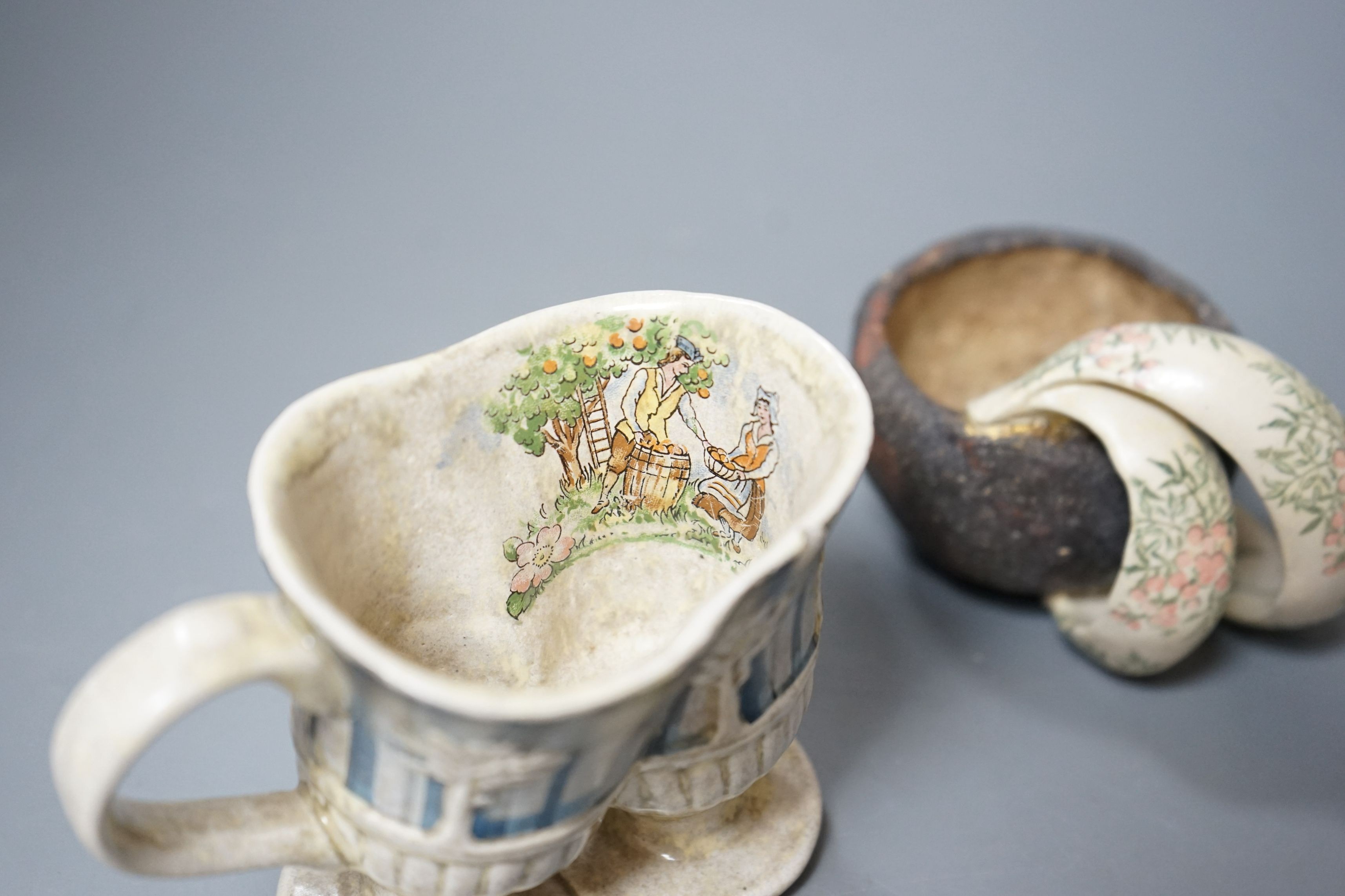 Carol McNicoll (b.1943), ‘Many a slip’ cup and another cup, with purchase receipt from Marsden Woo Gallery, 3 September 2015, tallest 10cm, (2)